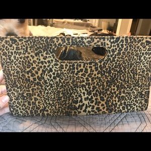 Express leopard clutch